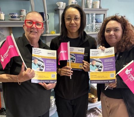 Volunteers and staff at charity shop